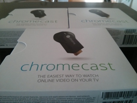 A photo of several Google Chromecast boxes