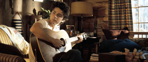 Still from A Complete Unknown - Timothée Chalamet as Bob Dylan