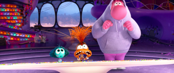Still from Inside Out 2 - Maya Hawk as Anxiety, Ayo Edebiri as Envy, and Paul Walter Hauser as Embarrassment