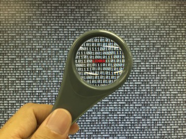 Image showing binary code magnifying glass showing password